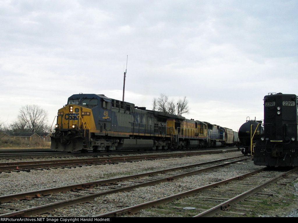 CSX 48 leads a northbound train out of the yard